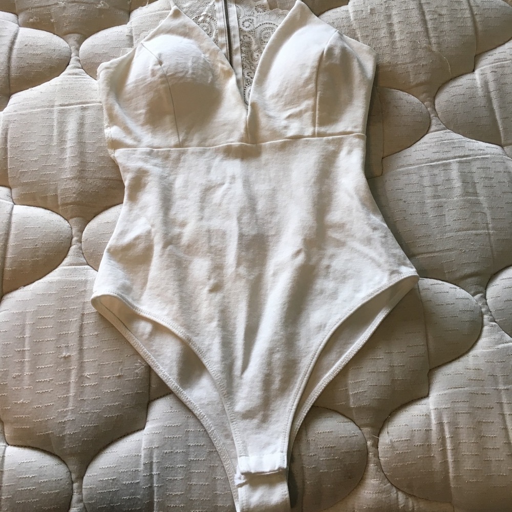 White, low cut body suit